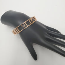 Load image into Gallery viewer, 18K ROSE GOLD PLATED STAINLESS STEEL ROMAN NUMERAL BANGLE