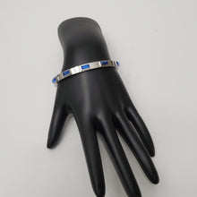 Load image into Gallery viewer, 18K WHITE GOLD PLATED STAINLESS STEEL BLUE STONE BANGLE
