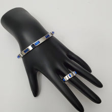 Load image into Gallery viewer, 18K WHITE GOLD PLATED STAINLESS STEEL BLUE STONE BANGLE