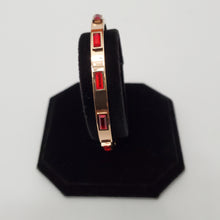 Load image into Gallery viewer, 18K RED GOLD PLATED STAINLESS STEEL BANGLE WITH RED STONE