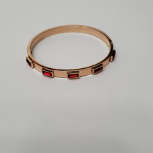Load image into Gallery viewer, 18K RED GOLD PLATED STAINLESS STEEL BANGLE WITH RED STONE