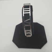 Load image into Gallery viewer, 18K WHITE GOLD PLATED STAINLESS STEEL ROMAN NUMERAL BANGLE
