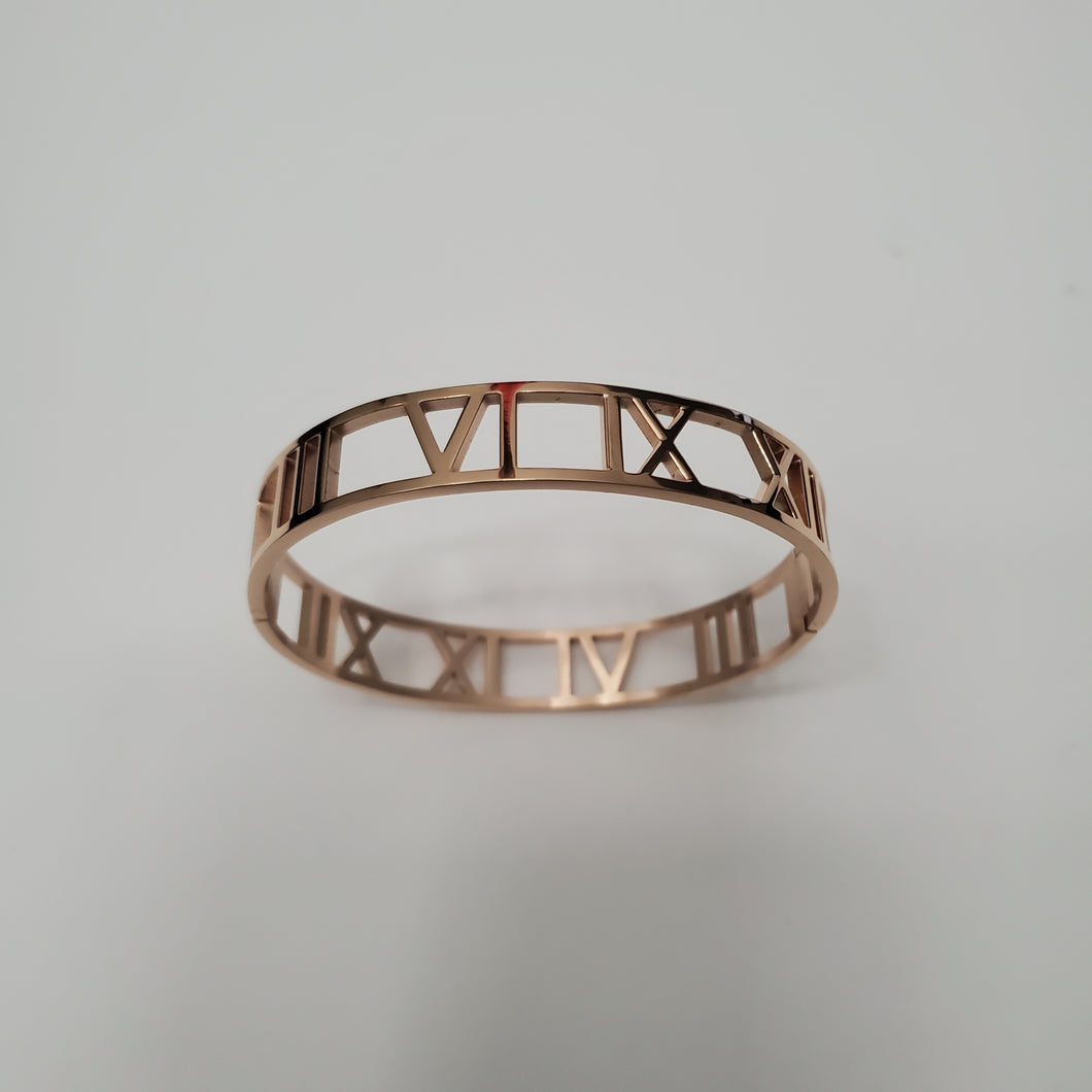 18K ROSE GOLD PLATED STAINLESS STEEL ROMAN NUMERAL BANGLE