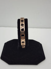 Load image into Gallery viewer, 18K ROSE GOLD PLATED STAINLESS STEEL SMALL ROMAN NUMERIAL BANGLE
